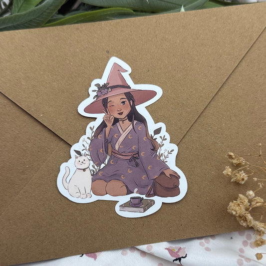 Cute Pink Witch Sticker – Kawaii Hexe mit weißer Katze und Teetasse | Cozy Witch Vinyl Sticker für Journal & Laptop