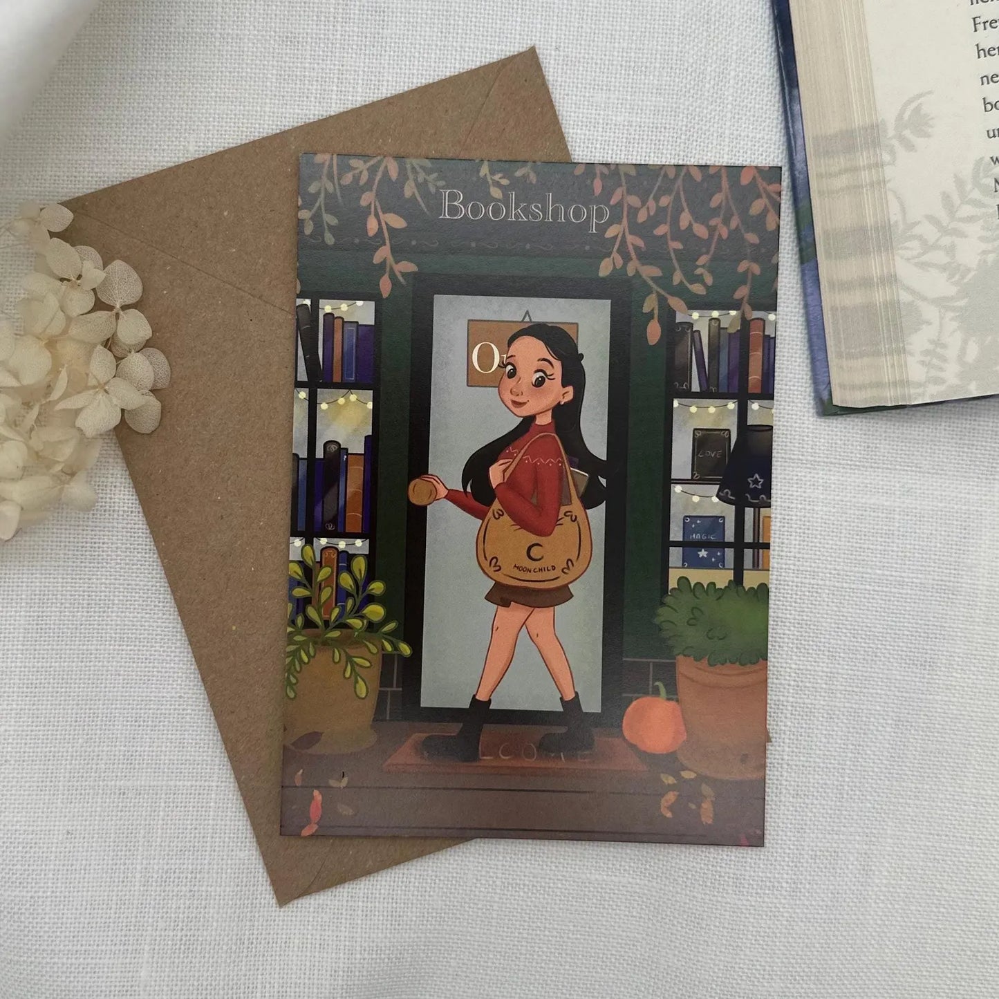 Postkarte Buchladen im Herbst - Bücherwurm Illustration A6 | Cozy Herbstkunst mit Leseglück